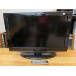 A Toshiba colour television with an 80cm screen