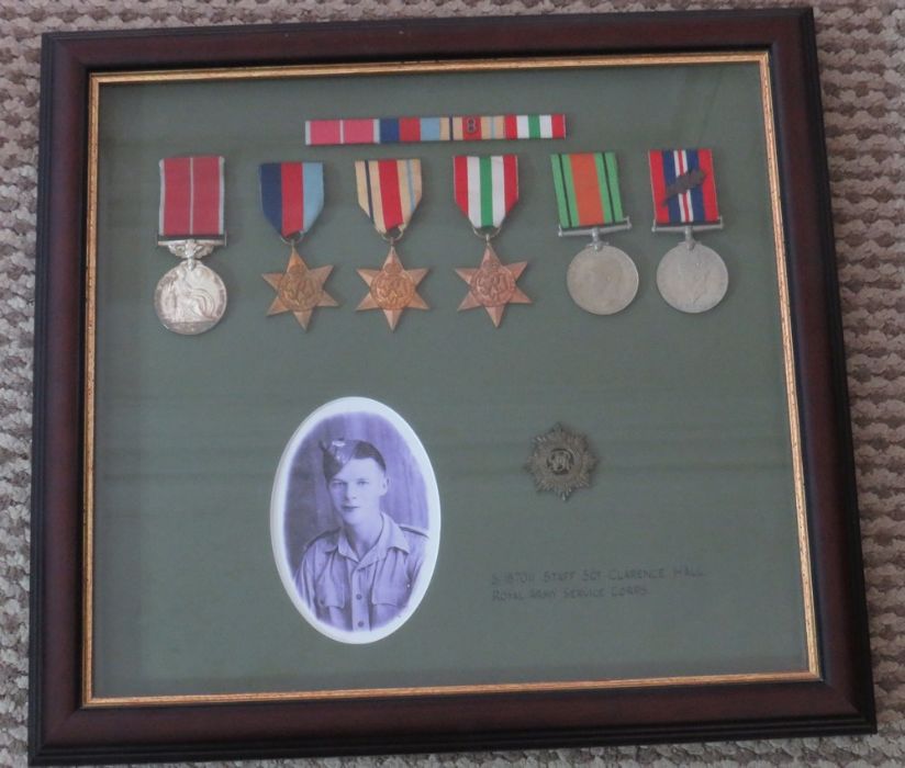 A framed group of WWII medals awarded to Staff SGT Clarence Kall . Royal Army Corps. To include