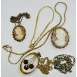 A selection of rolled gold and other goldtone jewellery, featuring two shell cameos. (7)