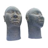 A pair of 20th century bronze Ife heads from Nigeria. Approximately 31 cms in height. Please note