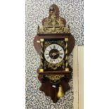 A large Dutch style reproduction  barge wall clock with two train driven movement, 6" dial, striking