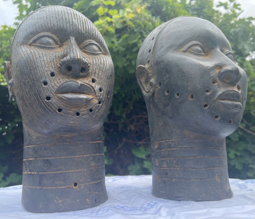 A pair of 20th century bronze Ife heads from Nigeria. Approximately 31 cms in height. Please note - Image 2 of 5