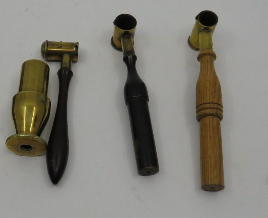 3 Antique gun powder shot measures, made of brass with wooden handles, one by G & J W Hawksley and a