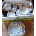 A 6-piece tea set by Johnson Brothers and 12 other plates, in good condition