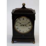 A late George III mahogany cased mantel clock, having a later brass eight day two train movement