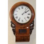 A late 19th century American drop dial walnut wall clock having a two train movement and enamel