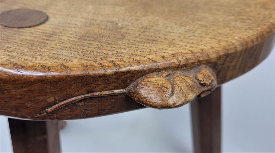 A Robert "Mouseman" Thompson oak three legged stool, the dished kidney shaped seat with carved mouse - Image 4 of 4