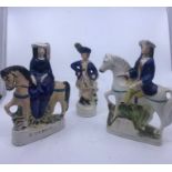 A collection of three Staffordshire figures (3)