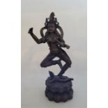 A 20th century Sino-Tibetan bronze figure of dancing Vajravarahi, holding Kartrika (flaying knife)