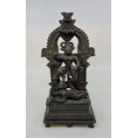 A 19th century Indian bronze figural altar of standing six armed Durga, height 25.2cm.