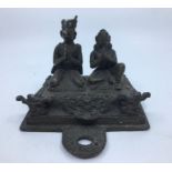 A 19th century Indian bronze altar figural group, height 11.8cm, width 15cm.