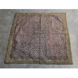 A 19th century Persian hand woven tapestry, olive green ground with embroidered bullion borders,