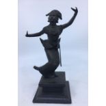 An early 20th century Far Eastern bronze figure of a dancing woman, raised upon wooden plinth