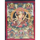 A 20th century Sino-Tibetan Thangka  of Vasudhara, probably Nepalese, gouache on cotton, within silk