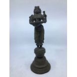 A 20th century Indian bronze figural lamp of Meenakshi, height 33cm. Note: One of a pair, for the