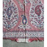 A pair of Persian curtains, the printed fabric with burgundy ground, each 239cm x 135cm. (2)