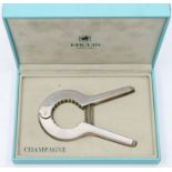 France: A boxed Ercuis, Paris, champagne opener, with inscribed French Football Federation crest