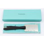 Chelsea: A boxed Tiffany & Co, silver luggage tag on strap, given to Sir Dave Richards upon