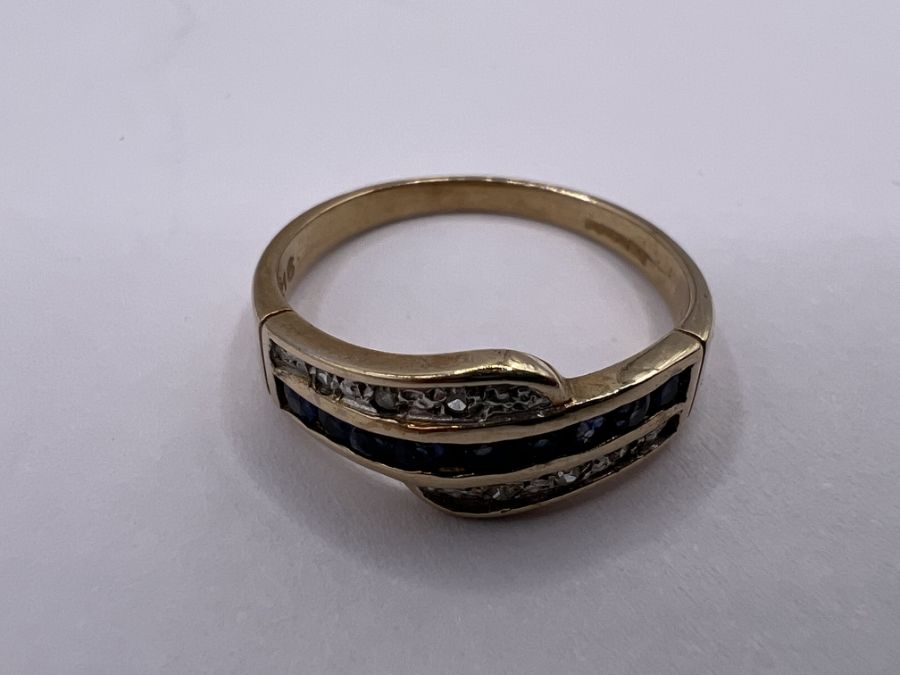 A 9ct gold sapphire and diamond dress ring. Approximate gross weight 2.6 grams. Size O1/2. (1) - Image 3 of 3