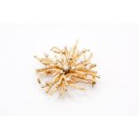 A mid 20th century French made organic branch form yellow metal brooch, studded with diamonds. Gross