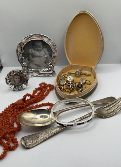 A selection of jewellery and collectables comprising two silver plated pewter photo frames, a