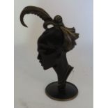 Richard Rohac (1906-1956) An Austrian patinated bronze model of a female profile head with feathered