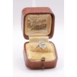 An Art Deco diamond panel ring in white metal, stamped "18ct & PT". Gross weight approximately 2.0