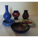 A group of Moorcroft items, in the Hibiscus pattern with blue background impressed Moorcroft, a