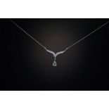 An 18ct gold  blueish-green tourmaline and diamond necklace with a Gems TV card stating the