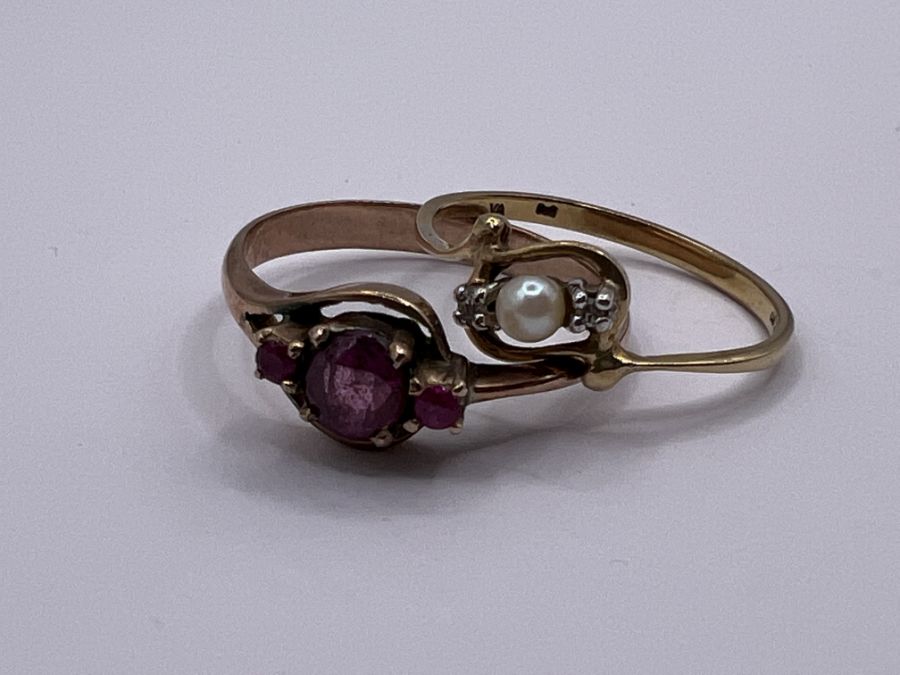 Two dainty dress rings. One a pink sapphire and yellow metal ring - unmarked - gross weight