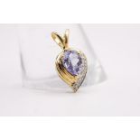 An 18ct yellow gold Tanzanite and diamond pear drop pendant. Approximate weight 2.0 grams. (1)