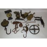 A mixed collection of brass to include various scales, 2 metat turning devices, a vetinary houses
