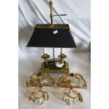 An electric table lamp and 2 wall lights with crystal droplets .