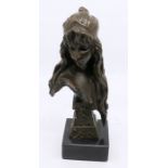 Bronzed resin figure of Carmel on a marble base. 23cm high 7.5cm wide