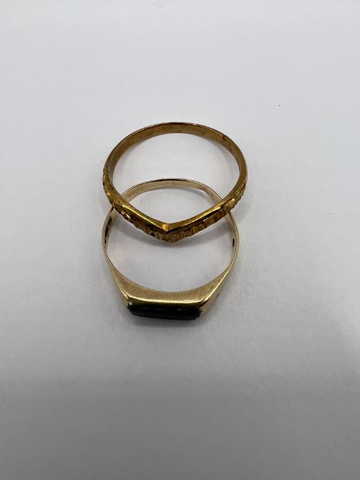 Two 9ct gold rings - one a diamond cut texture wishbone ring, size N 1/2, approximate weight 1.2