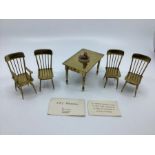Rare metal dolls Miniature metal polished and lacquered brass table and chairs. ERJ miniatures ltd