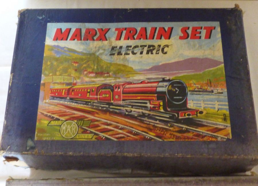 A boxed Marx O Gauge tin plate electric train set, 3 rail, oval track, with lithographic decoration.