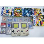 A collection of Nintendo Game Boy handheld consoles, games and accessories. To include: 16x assorted