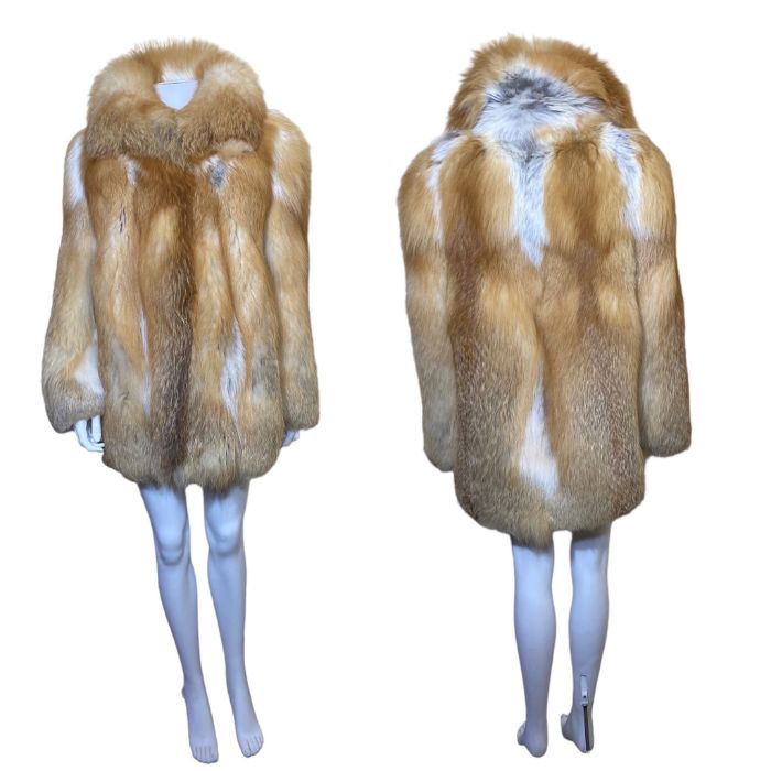 A vintage 1970s orange fox fur jacket, longer length, with gold satin lining by Sovereign furs