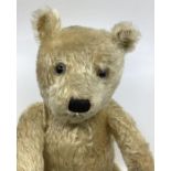 Antique Chiltern teddy Bear 22” in golden good mohair fully articulated and with glass pale aqua