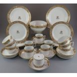 An early nineteenth century hand-painted porcelain part tea service, possibly Coalport, c. 1805.