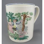 An early nineteenth century transfer-printed and hand-coloured creamware mug c. 1820. It is unmarked