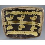 A superb eighteenth century rectangular large slipware dish, c. 1770-80. It is decorated with yellow