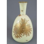 A late nineteenth century Derby porcelain bottle-shaped vase, c. 1888. It has fine raised gilding on