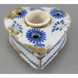 An eighteenth century tin glazed earthenware blue and white delft heart-shaped ink well, c. 1760. It