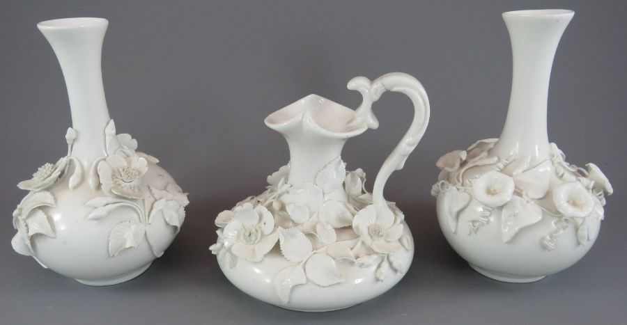 A group of mid-nineteenth century Derby white porcelain flower encrusted wares, c. 1865. To