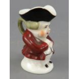 A late nineteenth century hand-painted porcelain Derby Stevenson and Hancock miniature toby jug,