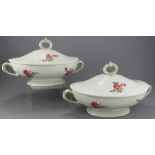 A pair of late nineteenth century printed and painted porcelain Mintons soup tureens and covers,