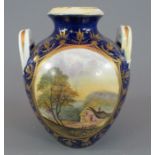An early nineteenth century Derby porcelain two-handled vase, c. 1820. It is decorated with a