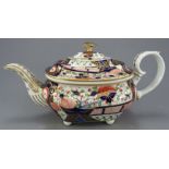 An early nineteenth century Derby hand-painted porcelain imari-style teapot on four ball feet, c.